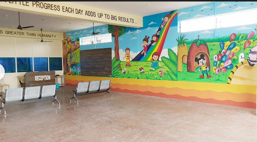 Reception area at Sri Chalapati School with colourful educational murals